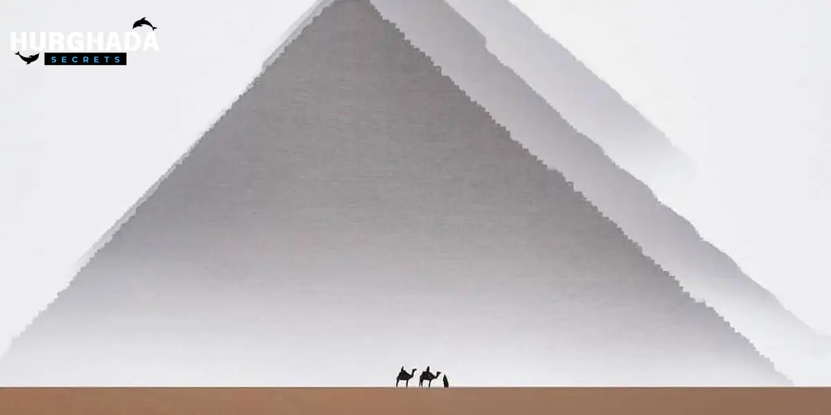 Camels in front of the pyramids from a big distance