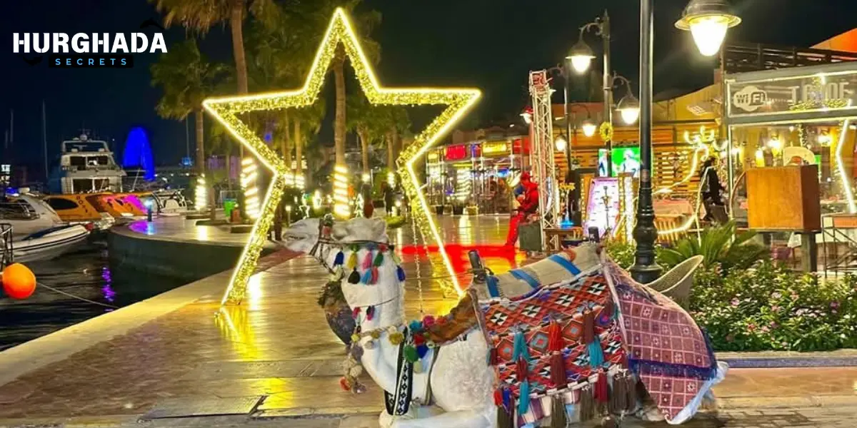a camel in front of nighttime market in Hurghada with illuminated star and souvenir stalls