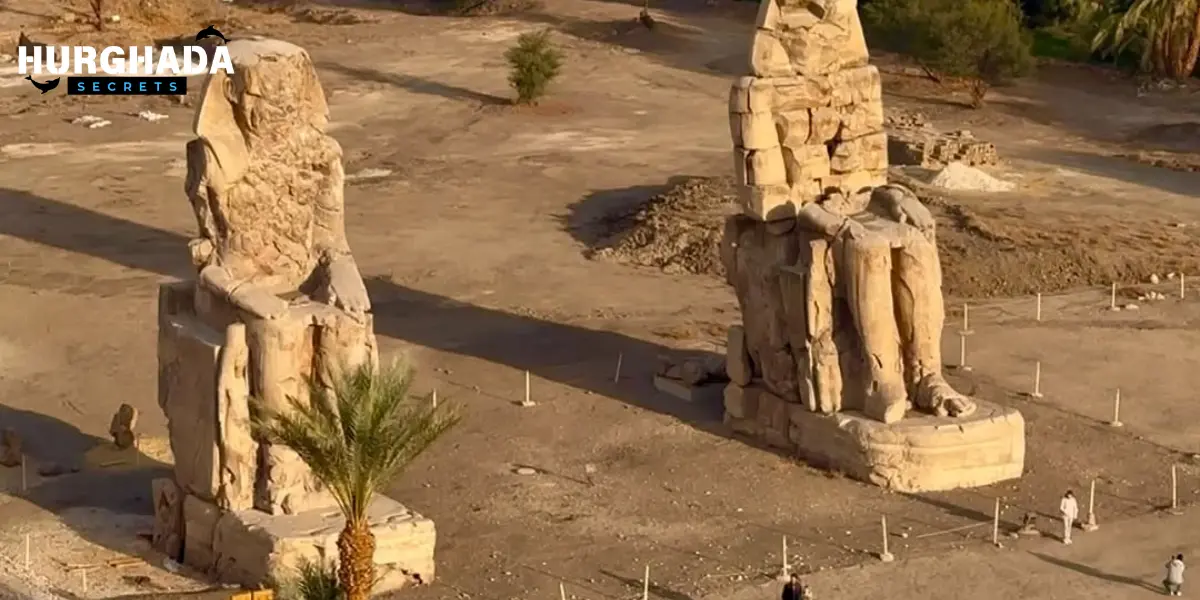 Corridor at Luxor Temple with two large statues (Ramses II)