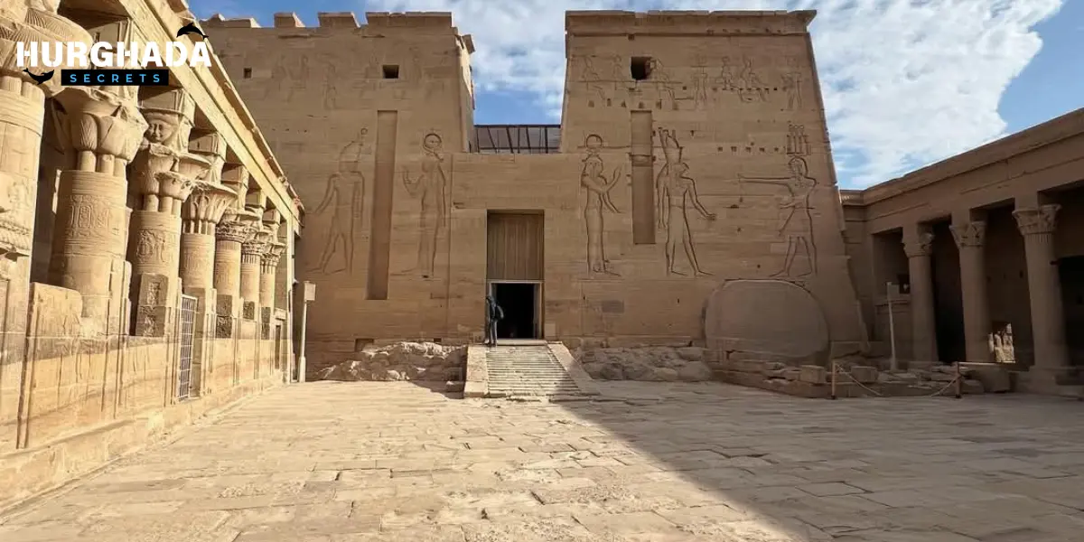Entrance of an ancient Egyptian temple with vertical reliefs