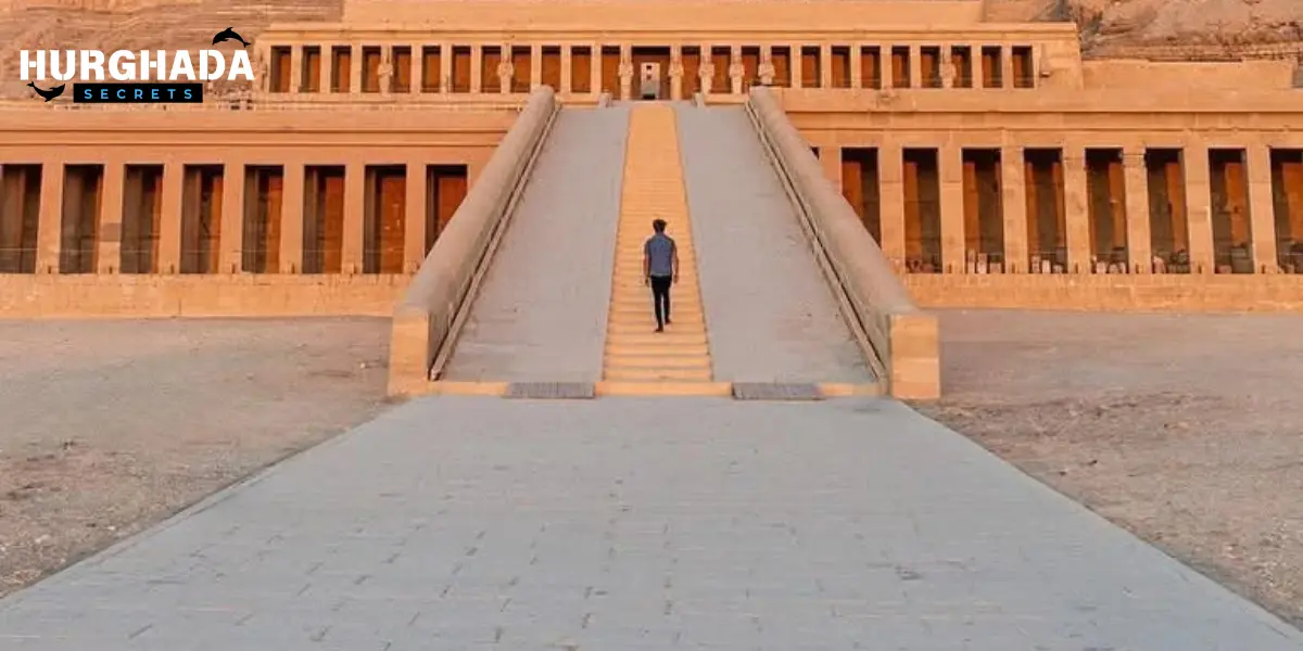 Person walking up the grand ramp of Hatshepsut Temple