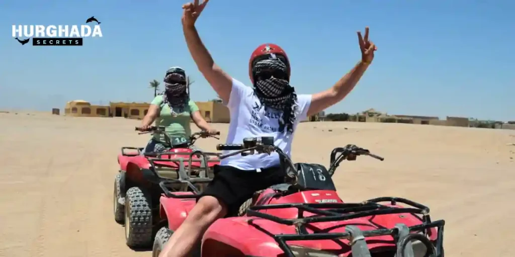 quad-safari-three-hours-1 A man and a woman ride a quad bike on a safari in Hurghada.